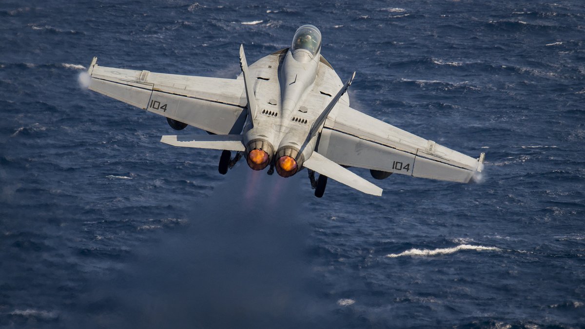 Aircraft from Carrier Air Wing 2 take to the skies above USSCarlVinson during recent flight operations in the South China Sea as part of the Carl Vinson Strike Group's continuing deployment in the Western Pacific. 