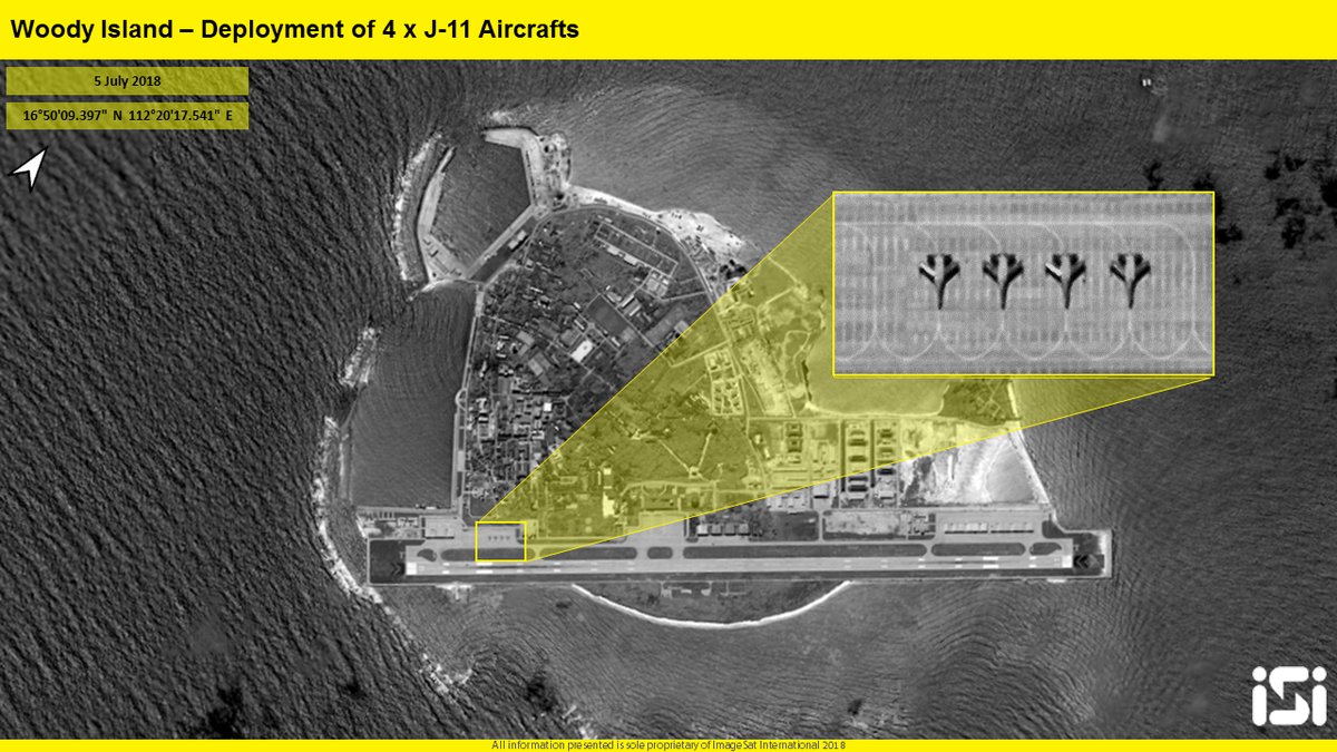 A quartet of J-11 Chinese fighter aircrafts at operational deployment in Woody Island, South China Sea.   