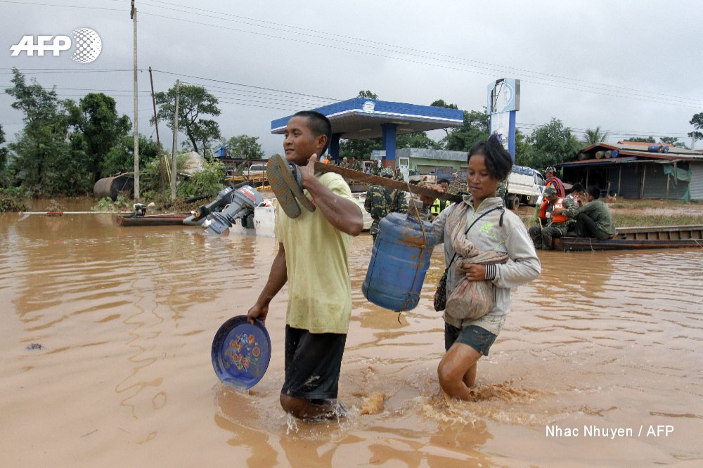 Rescuers battle fresh rains to reach scores of people still missing after a dam collapse in southern Laos    