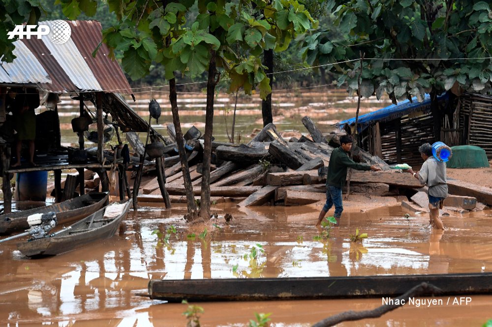 Rescuers battle fresh rains to reach scores of people still missing after a dam collapse in southern Laos    