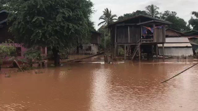VIDEO: Laotians return to their village ravaged by flash floods to see dead cows and devastated homes   