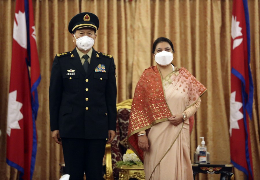 Nepali President Bidya Devi Bhandari and Prime Minister K.P. Sharma Oli meet with visiting Chinese State Councilor and Defense Minister Wei Fenghe, and both sides agree to strengthen bilateral ties and military cooperation