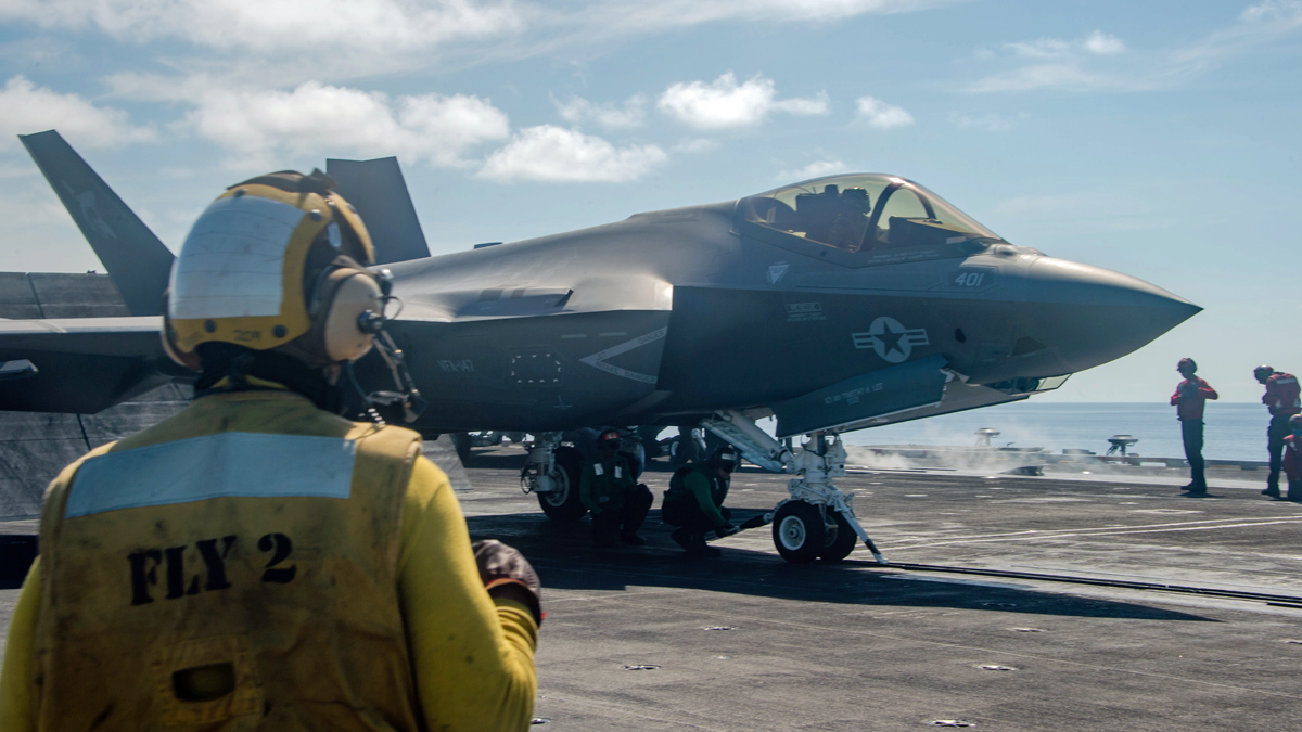 USNavy Sailors manage the flight deck aboard aircraft carrier USSCarlVinson during operations this week in the South China Sea