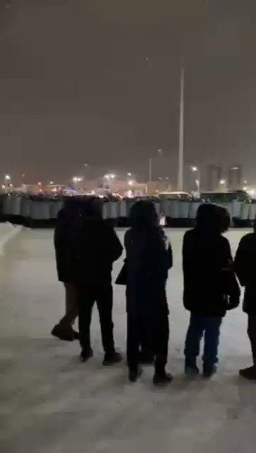 Kazakhstan: protesters face a wall of riot police in the city of Karagandy