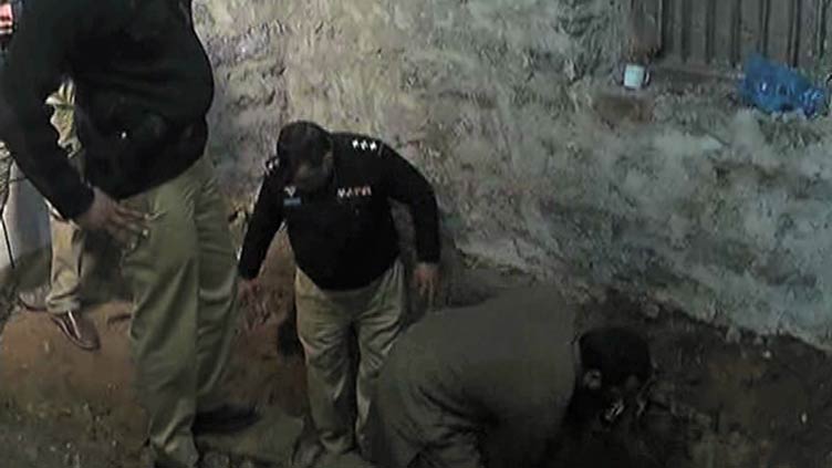 Karachi: Security forces recover rusted weapons buried underground