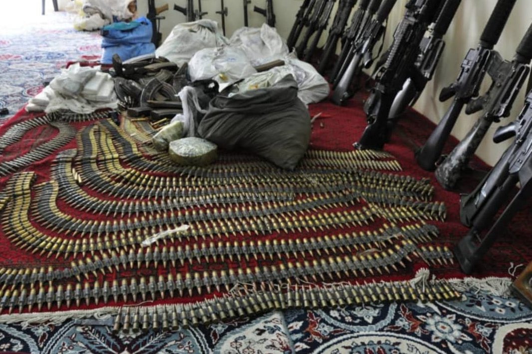 Border guards in southern Kandahar province have arrested two men with a large number of weapons they were trying to smuggle into Pakistan, Al badr army corps media office said