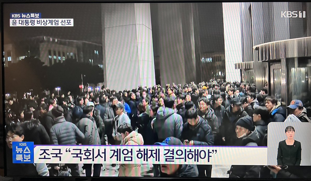 Cheers erupt as soldiers are pulling back from the building. For now, the South Korean people have successfully stopped soldiers from entering parliament