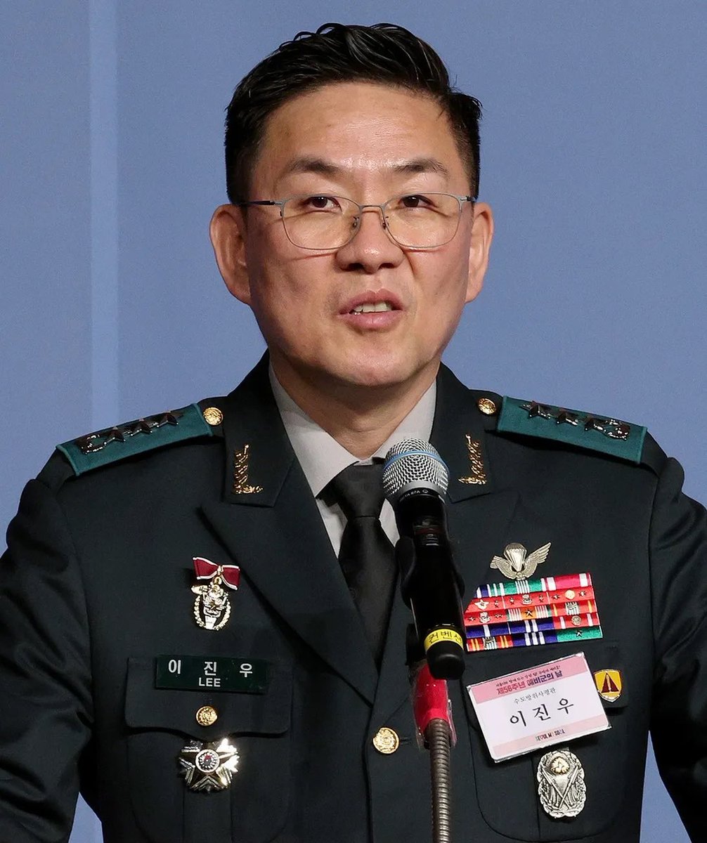 South Korean Prosecutors are seeking an Arrest Warrant for Lieutenant General Lee Jin-woo, the Head of Capital Defense Command, for his involvement in the Martial Law Plot led by Impeached President Yoon Suk Yeol. Lee has been detained since Friday, with him being Questioned on Saturday by Investigators