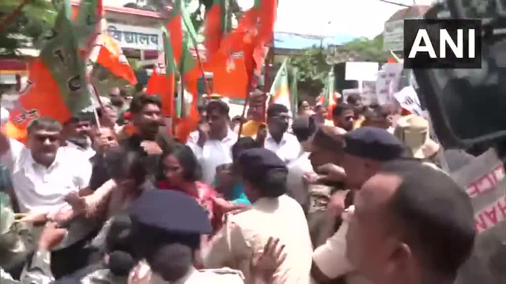 Jharkhand: BJP workers clash with Police personnel as the former staged a protest against derogatory remarks on PM Modi and his mother at a Mahagathbandhan event in Darbhanga, Bihar