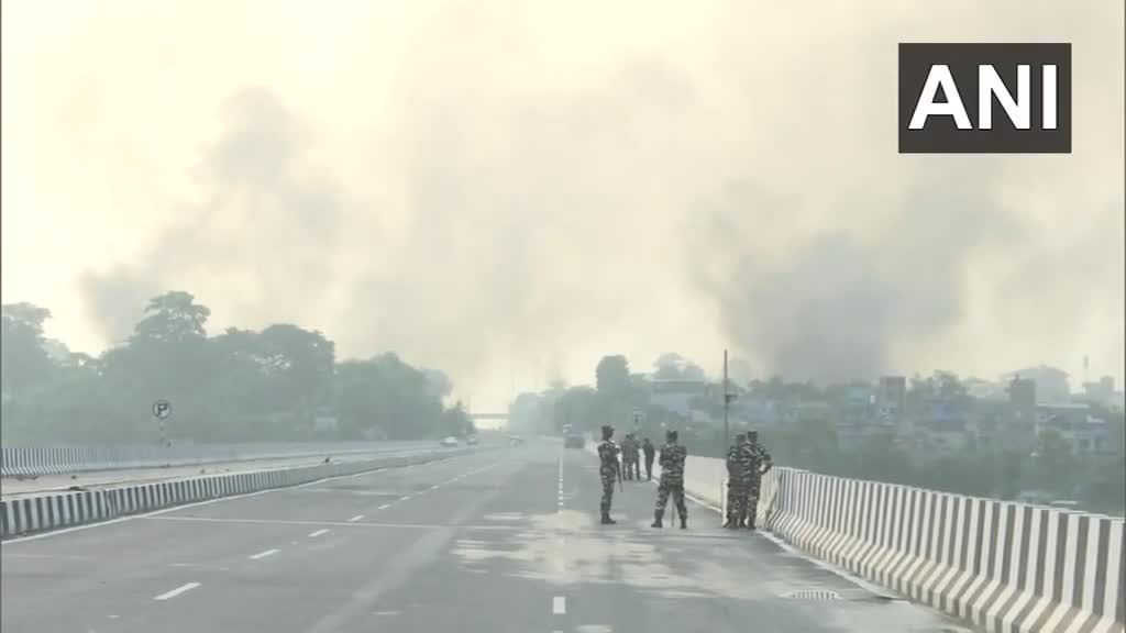 Thick smoke rises from the Nepali town of Kakadbhitta amid violent protests in the country, as seen from India's Panitanki. The Miteri bridge connecting India's Panitanki and Nepal's Kakadbhitta is being secured by SSB personnel on the India side