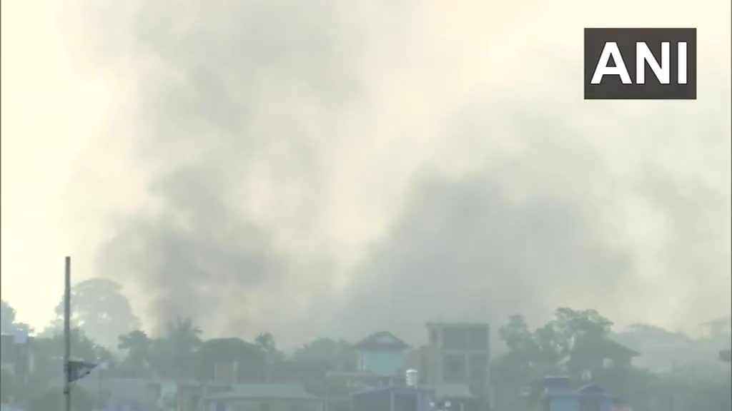 Thick smoke rises from the Nepali town of Kakadbhitta amid violent protests in the country, as seen from India's Panitanki. The Miteri bridge connecting India's Panitanki and Nepal's Kakadbhitta is being secured by SSB personnel on the India side