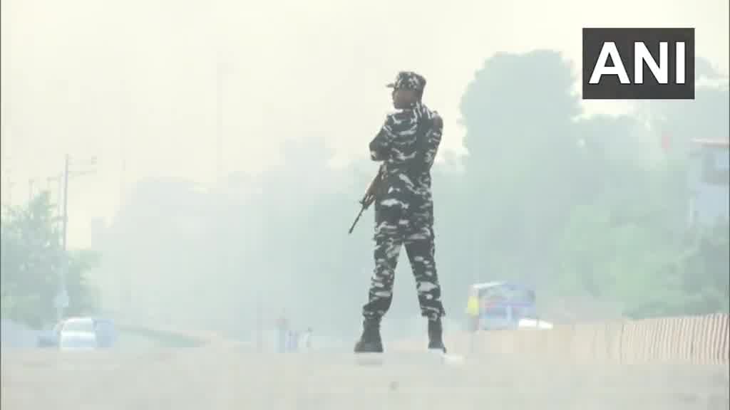 Thick smoke rises from the Nepali town of Kakadbhitta amid violent protests in the country, as seen from India's Panitanki. The Miteri bridge connecting India's Panitanki and Nepal's Kakadbhitta is being secured by SSB personnel on the India side