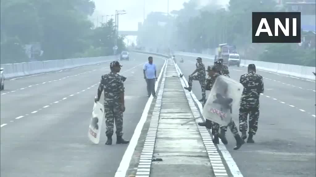Thick smoke rises from the Nepali town of Kakadbhitta amid violent protests in the country, as seen from India's Panitanki. The Miteri bridge connecting India's Panitanki and Nepal's Kakadbhitta is being secured by SSB personnel on the India side