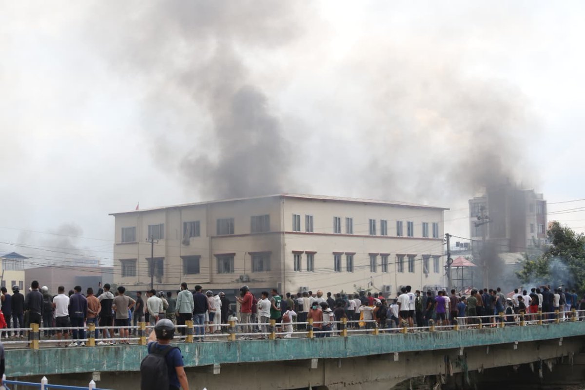 Protesters set fire to the central office of the CPN-UML in Chyasal. Photo: Nepal Photo Library